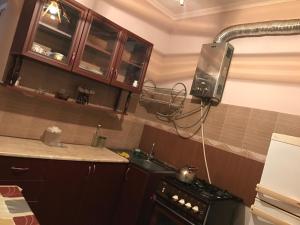 Kuchyň nebo kuchyňský kout v ubytování Guest House Nua