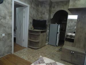 TV a/nebo společenská místnost v ubytování Guest House Nua