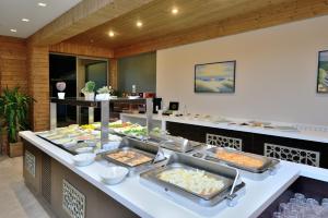 a buffet line with many different types of food at Lugga Boutique Hotel & Beach in Ortakent