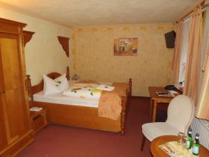 Ένα ή περισσότερα κρεβάτια σε δωμάτιο στο Hotel Piccolo