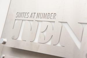 a sign that reads cures at number zero at Suites at number Ten in Broadstairs
