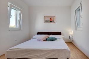 Postel nebo postele na pokoji v ubytování Villa Mathilde