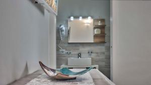 Vannituba majutusasutuses Smart Suite & Apartments