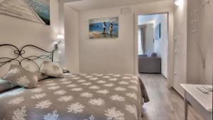 Voodi või voodid majutusasutuse Smart Suite & Apartments toas