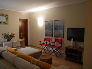 Uma área de estar em La Maison du Soleil Appartamento Alba Pompeia