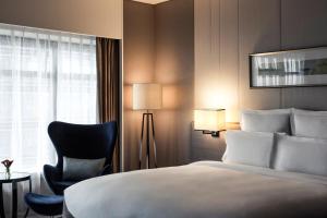 Letto o letti in una camera di Pullman Shanghai Xuhui