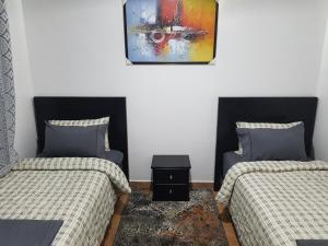 Voodi või voodid majutusasutuse Chalet Asmoun toas