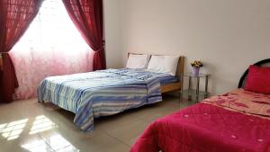 Postel nebo postele na pokoji v ubytování Mahkota Cheras Sweet Condo 1-14 pax near MRT to KL