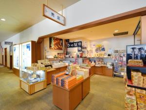 a store with a lot of products on display at Hotel Wellness Notoji in Hakui