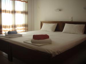 Posteľ alebo postele v izbe v ubytovaní Eros-Iros Portside Stays Skiathos
