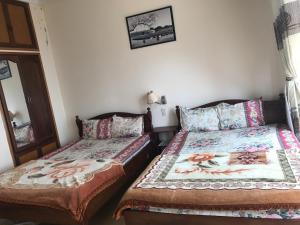 Postel nebo postele na pokoji v ubytování My Anh Guest House