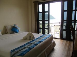 Voodi või voodid majutusasutuse Phi Phi Green House & Sunsky Hostel toas