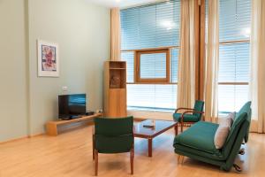 TV a/nebo společenská místnost v ubytování Hotel Kongressissimo