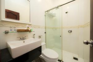 Koupelna v ubytování SCAT Hotel- New World Bến Thành