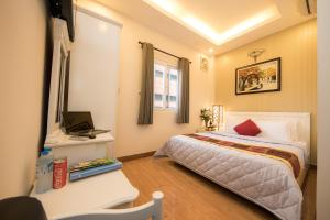 TV a/nebo společenská místnost v ubytování SCAT Hotel- New World Bến Thành