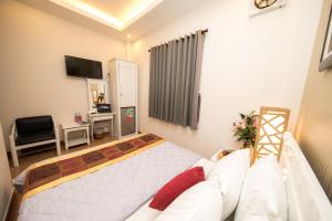 TV a/nebo společenská místnost v ubytování SCAT Hotel- New World Bến Thành