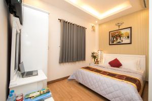 TV a/nebo společenská místnost v ubytování SCAT Hotel- New World Bến Thành