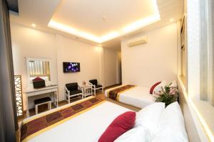TV a/nebo společenská místnost v ubytování SCAT Hotel- New World Bến Thành
