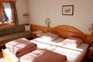 Tempat tidur dalam kamar di Hotel Soliva