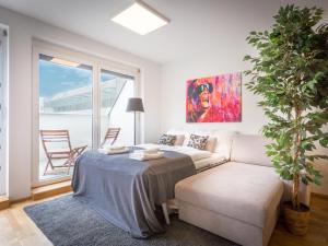 Posteľ alebo postele v izbe v ubytovaní SKY9 Penthouse Apartments