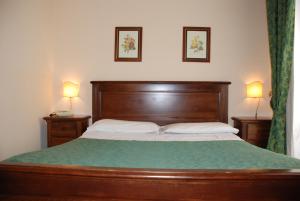 Postel nebo postele na pokoji v ubytování Hotel del Centro