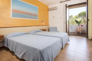 Letto o letti in una camera di Hotel Oasis