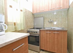 Kuchyň nebo kuchyňský kout v ubytování House Snjezana 1379