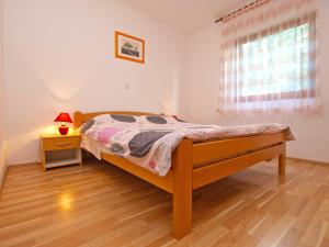 Postel nebo postele na pokoji v ubytování House Snjezana 1379