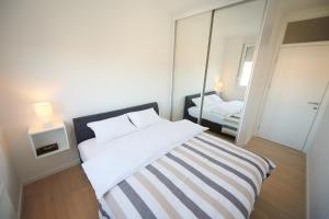 Postel nebo postele na pokoji v ubytování Modern luxurious apartment
