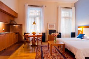 Posteľ alebo postele v izbe v ubytovaní Hapimag Apartments Athens