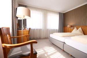 Postel nebo postele na pokoji v ubytování Hotel Alter Wirt