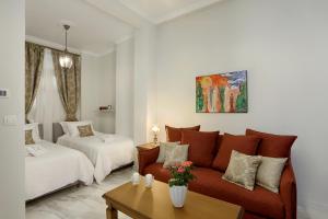 Posteľ alebo postele v izbe v ubytovaní V1935 Luxurious Apartments