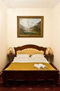 מיטה או מיטות בחדר ב-Hotel Maryo