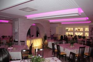 A restaurant or other place to eat at Hotel Miramare