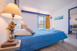 Postel nebo postele na pokoji v ubytování Lagrange Vacances Le Lydia Playa + 9 fotografií