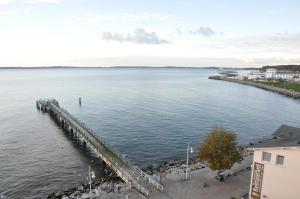 a large body of water with a dock at Fürstenhof Sassnitz in Sassnitz