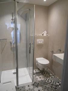 Koupelna v ubytování Régina Boutique Hotel