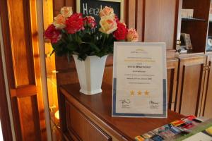 Certifikát, hodnocení, plakát nebo jiný dokument vystavený v ubytování Hotel Windthorst
