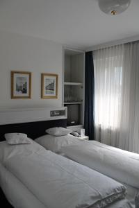 Postel nebo postele na pokoji v ubytování Hotel Windthorst + 31 fotografií
