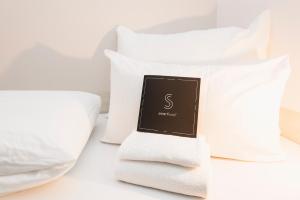 Postel nebo postele na pokoji v ubytování Smarthotel Tromsø