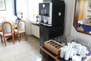 Kuchyň nebo kuchyňský kout v ubytování Hotel Windthorst