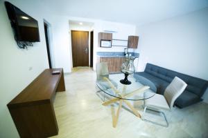 TV a/nebo společenská místnost v ubytování Aquamarina Hotel
