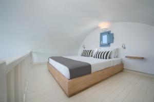 Apanemo Hotel & Suites房間的床