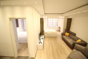 Postel nebo postele na pokoji v ubytování Super Luxury Apartments