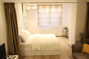 Postel nebo postele na pokoji v ubytování Super Luxury Apartments