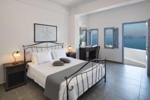 Apanemo Hotel & Suites房間的床
