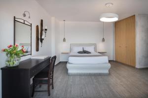 Apanemo Hotel & Suites房間的床