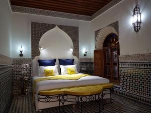 Cama ou camas em um quarto em Riad Soleil d'Or