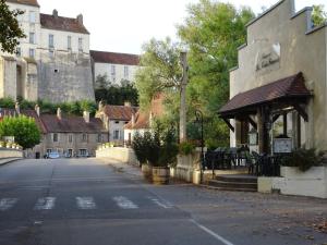 an empty street in a town with a gazebo at Mobile-Home 1 "Ognon" in Pesmes +10 photos