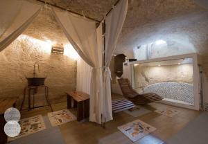 Postel nebo postele na pokoji v ubytování Palazzo Guglielmo + 31 fotografií